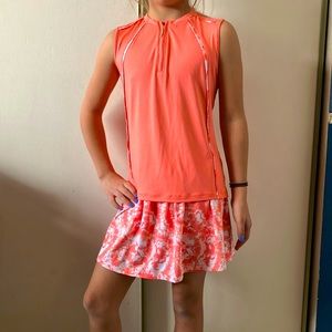 Garb girls coral and white golf outfit.
